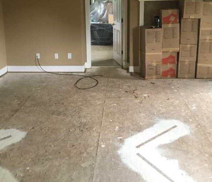 master bedroom floor mitigated after having been flooded with water in Broomfield home
